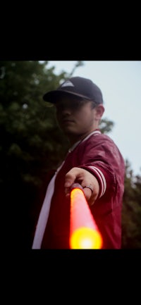 a man holding a flashlight