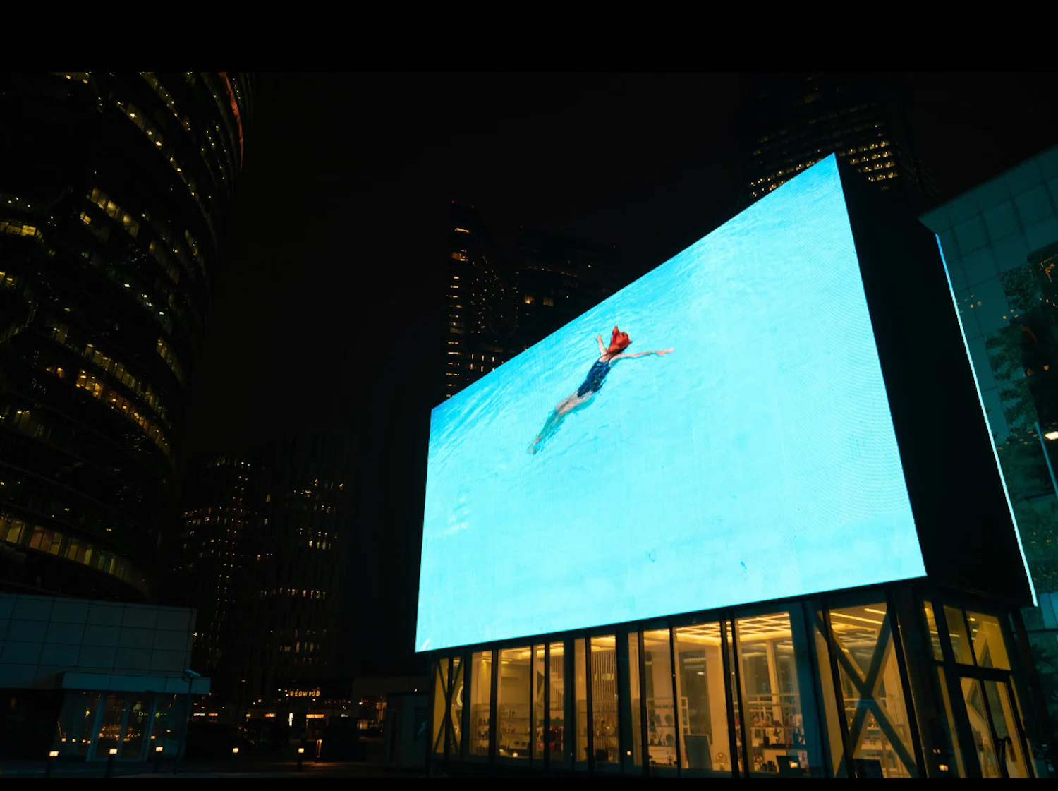 a person is swimming in a pool