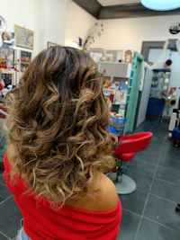 the back of a woman's hair in a salon