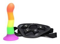 a rainbow colored dildo with a strap