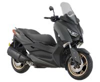 a black motorcycle is parked on a black background