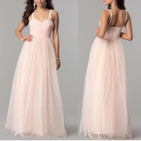 a beautiful bridesmaid dress with a strapless neckline and tulle skirt