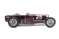 a maroon racing car on a white background