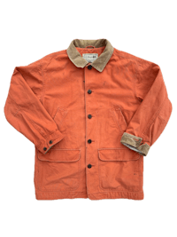 an orange jacket with a tan collar