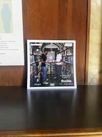 a picture of a person sitting on a desk