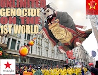 a group of people are walking down a street with a balloon in the background
