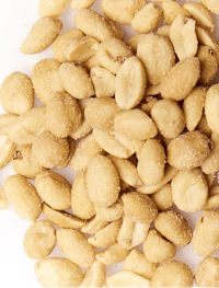 a pile of peanuts on a white background