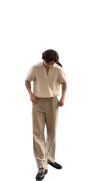 a man wearing a white shirt and tan pants