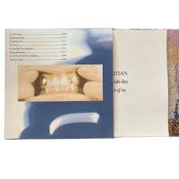 an open book with a picture of a tooth