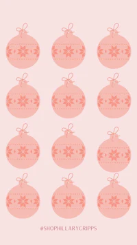 pink christmas ornaments on a pink background