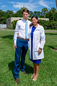 a man and a woman posing for a photo