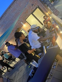 a group of people sitting at a table