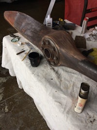 a propeller is sitting on a piece of cloth