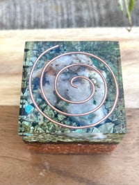 a box with a spiral design on it
