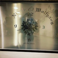 a mirror with a clock on it