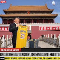 a man holding a jersey in front of a building