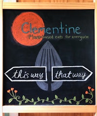 a chalkboard sign that reads clementine