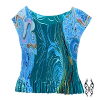 a women's blue top with swirls and swirls on it