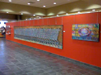 a painting hanging on a wall