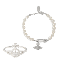 a bracelet with pearls and a ring