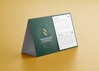 a green calendar on a yellow background