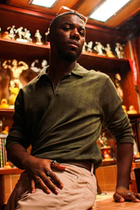 a man wearing a green shirt