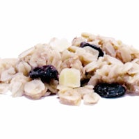 a pile of oats and raisins on a white background