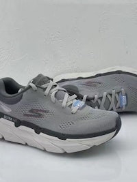 skechers men's running shoes on a white surface