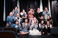 a group of people posing for a photo