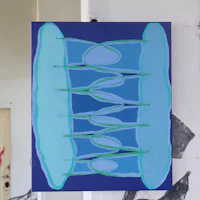 a painting of a blue and green painting hanging on a wall