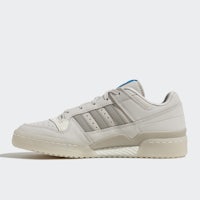 adi originals sneakers in white and blue