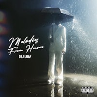 a man holding an umbrella in the rain