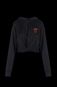 a black hoodie with an orange heart on it