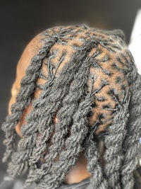 a woman with braids in her hair