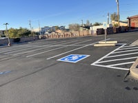 a parking lot with a blue line painted on it