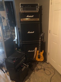 marshall amps and guitars in a garage