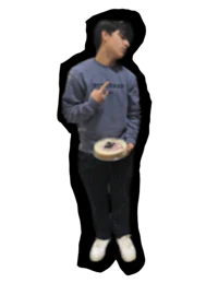 a young man holding a plate of food