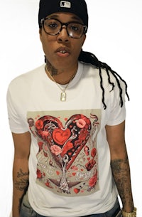 a man wearing a t - shirt with a heart on it