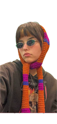 a person wearing a crocheted scarf