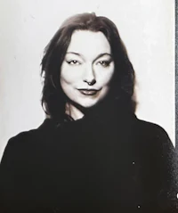 a black and white photo of a woman