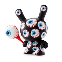a black toy with blue eyes and an eyeball