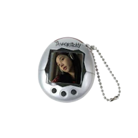 a small camera with a picture of a woman on it