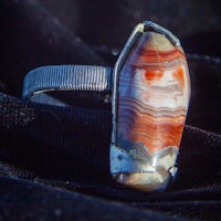 a ring with an agate stone on it