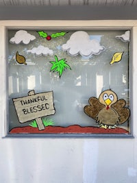 a window with a turkey on it