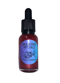 a bottle of liquid with the word moontide ritual on it