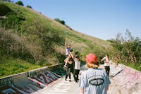 a group of people on a skateboard ramp