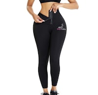 a woman wearing black leggings and a black top