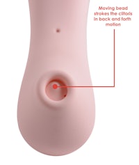 an image of a pink sex toy with a label on it