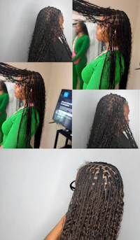 a woman is getting her hair braided