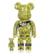 a teddy bear is next to a yellow teddy bear